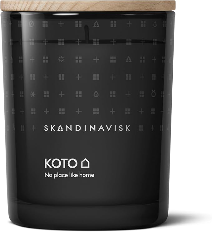 Skandinavisk KOTO 'Home' Scented Candle. Fragrance Notes: Vanilla Beans and Dried Orange Peel, Amber and Leather. 7.0 oz.
