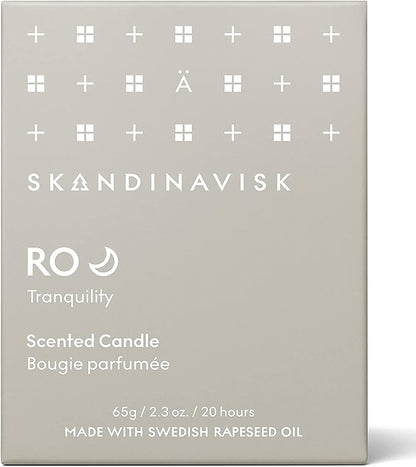 Skandinavisk RO 'Tranquility' Mini Scented Candle. Fragrance Notes: Cut Grass and Fallen Leaves, Cucumber and Wild Violets. 2.3 oz.