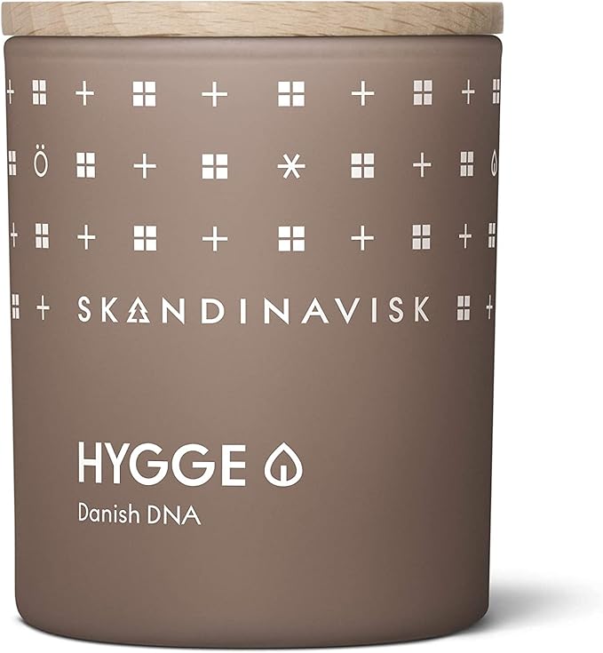 Skandinavisk Hygge 'Cosiness' Scented Candle. Fragrance Notes: Black Tea and Mint Leaves, Dried Apples and Baked Cinnamon. 7.0 oz.