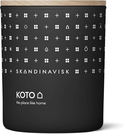 Skandinavisk KOTO 'Home' Mini Scented Candle. Fragrance Notes: Vanilla Beans and Dried Orange Peel, Amber and Leather. 2.3 oz.