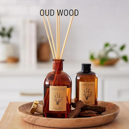 Craft & Kin Oud Wood Reed Diffuser – 5.75 oz Essential Oil Diffuser for Home & Bathroom – Up to 120-Day Fragrance with 8 Rattan Scent Sticks – Amber Glass Room Decor