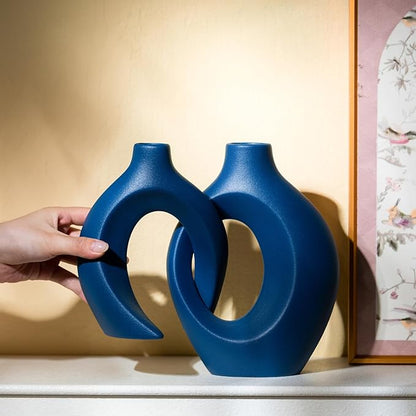 Levvohd Snuggle Hollow Ceramic Vase Set of 2, 8.4 inch Modern Nordic Coastal Shaped Pampas Grass Aesthetic Decorative Table Vases for Home Decor (Matte Navy Blue - M)