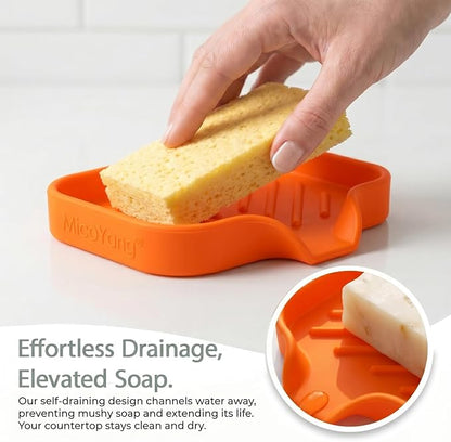 MicoYang Silicone Soap Dish with Drain Spout, Self-Draining Sink Organizer Tray for Bathroom and Kitchen, Sponges, Dispensers and Soap Holder, Non-Slip and Dishwasher Safe, Orange (Compact, 4.9"×3.2")