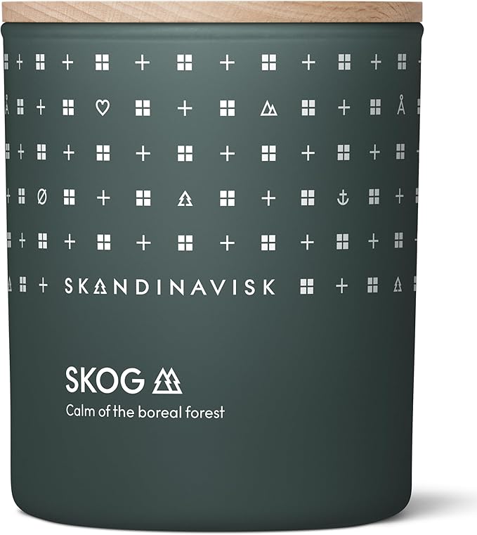 Skandinavisk Skog 'Forest' Scented Candle. Fragrance Notes: Pine Needles and Fir Cones, Birch Sap and Lily of The Valley. 7.0 oz.