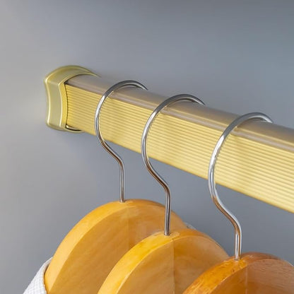 Premium hourglass closet rod - custom cut to size. Hourglass shaped wardrobe tube, protective top cover, seamless and reversible with ribbed and smooth sides. (Matte Brass)