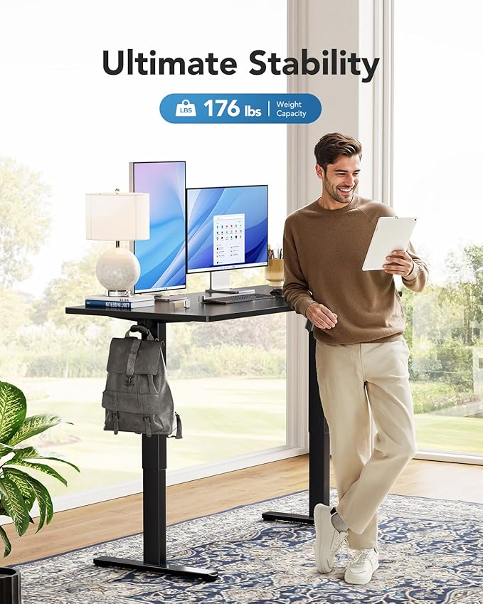 HUANUO Electric Standing Desk, Whole Piece Desktop, Adjustable Height Computer Desk, 4 Height Memory Settings, Sit Stand Up Desk for Home Office, 40" x 24", Black