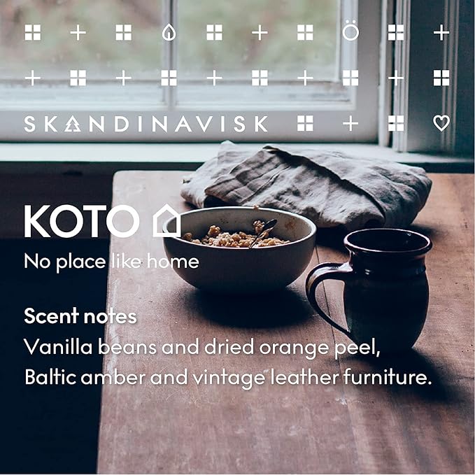 Skandinavisk KOTO 'Home' Mini Scented Candle. Fragrance Notes: Vanilla Beans and Dried Orange Peel, Amber and Leather. 2.3 oz.