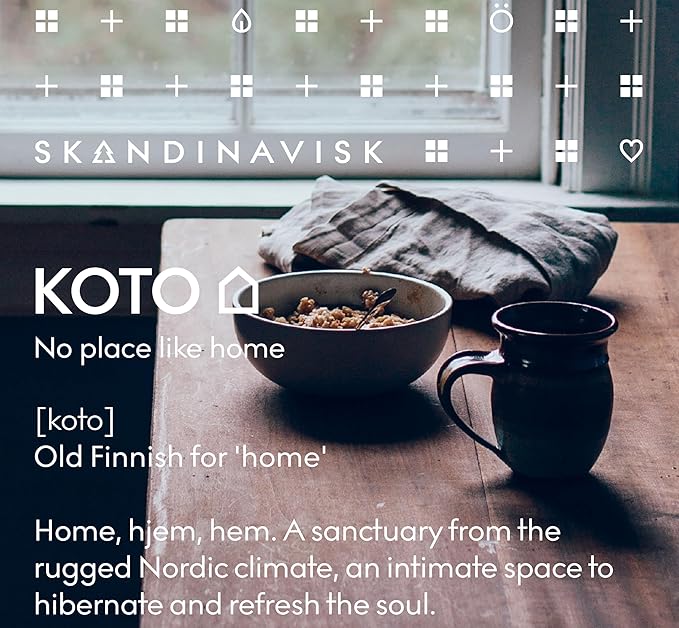 Skandinavisk KOTO 'Home' Scented Candle. Fragrance Notes: Vanilla Beans and Dried Orange Peel, Amber and Leather. 7.0 oz.