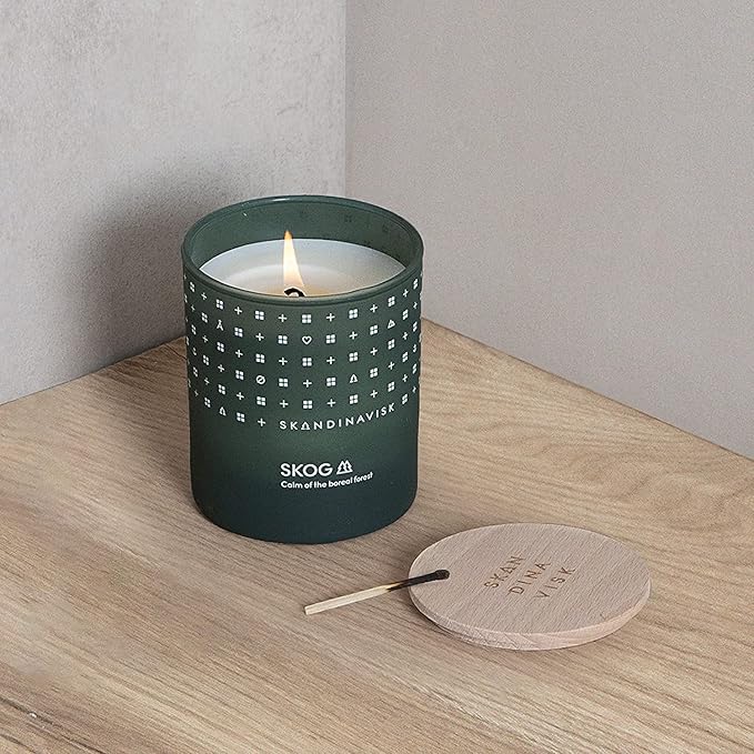 Skandinavisk Skog 'Forest' Mini Scented Candle. Fragrance Notes: Pine Needles and Fir Cones, Birch Sap and Lily of The Valley. 2.3 oz.