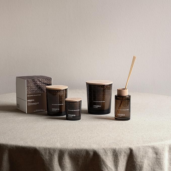 Skandinavisk Hygge 'Cosiness' Mini Scented Candle. Fragrance Notes: Black Tea and Mint Leaves, Dried Apples and Baked Cinnamon. 2.3 oz.