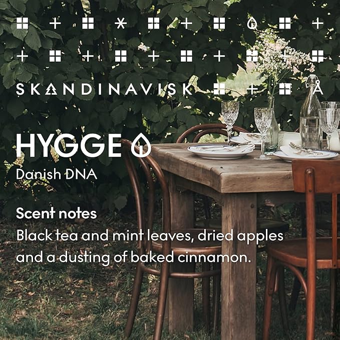 Skandinavisk Hygge 'Cosiness' Scented Candle. Fragrance Notes: Black Tea and Mint Leaves, Dried Apples and Baked Cinnamon. 7.0 oz.