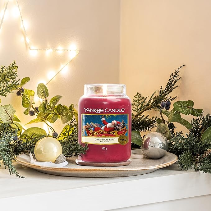 Yankee Candle Christmas Eve Scented, Classic 22oz Large Jar Single Wick Candle, Over 110 Hours of Burn Time