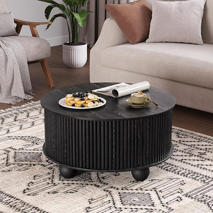 SULIVES Round Coffee Table with Storage, Unique Circle Coffee Table with Sliding Door,Fluted Accent Center Table with Bun Feet for Living Room, Black