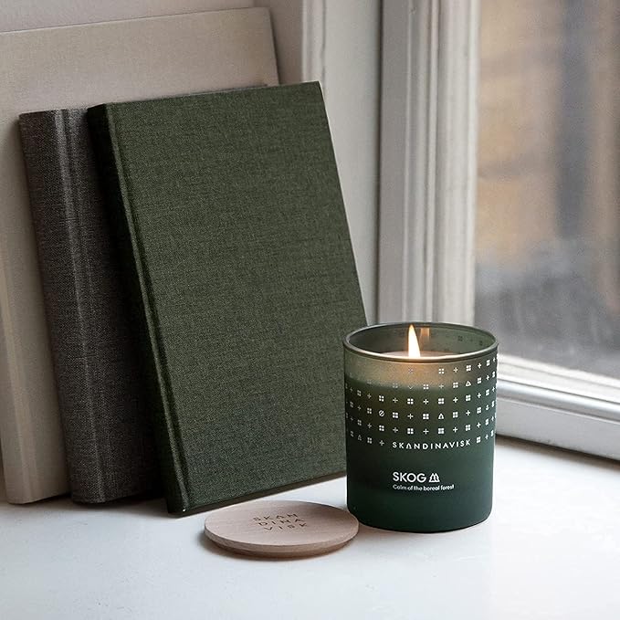 Skandinavisk Skog 'Forest' Mini Scented Candle. Fragrance Notes: Pine Needles and Fir Cones, Birch Sap and Lily of The Valley. 2.3 oz.